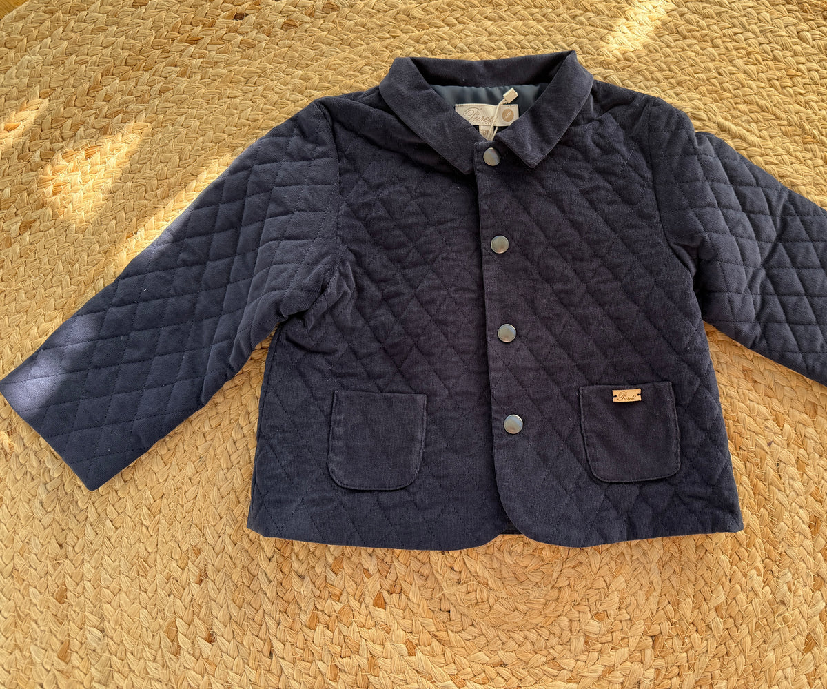 Veste matelassée en velours bleu marine
