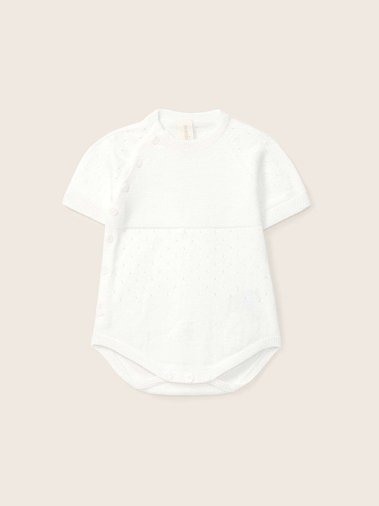Combi-short à manches courtes tricoté en coton biologique