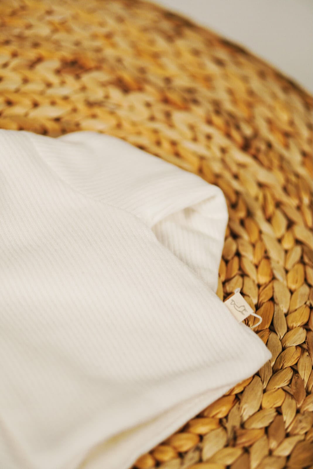 Veste bébé écrue à capuche doublée en maille côtelée